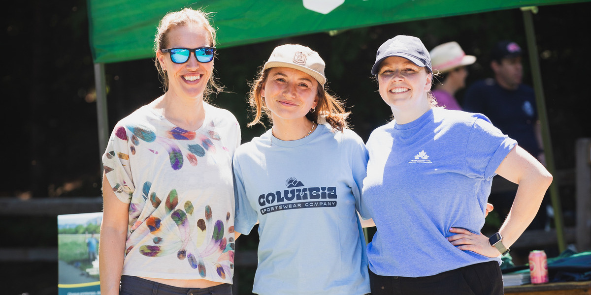 BC - Sea to Sky Trail Pemberton Photo Credit Brent Harrewyn | Trans Canada Trail women smiling in tshirts on a sunny day