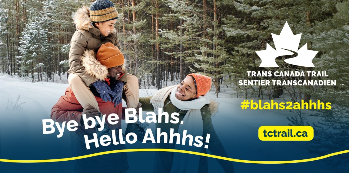 family smiling in the snow with blahs2ahhhs manulife text overlay