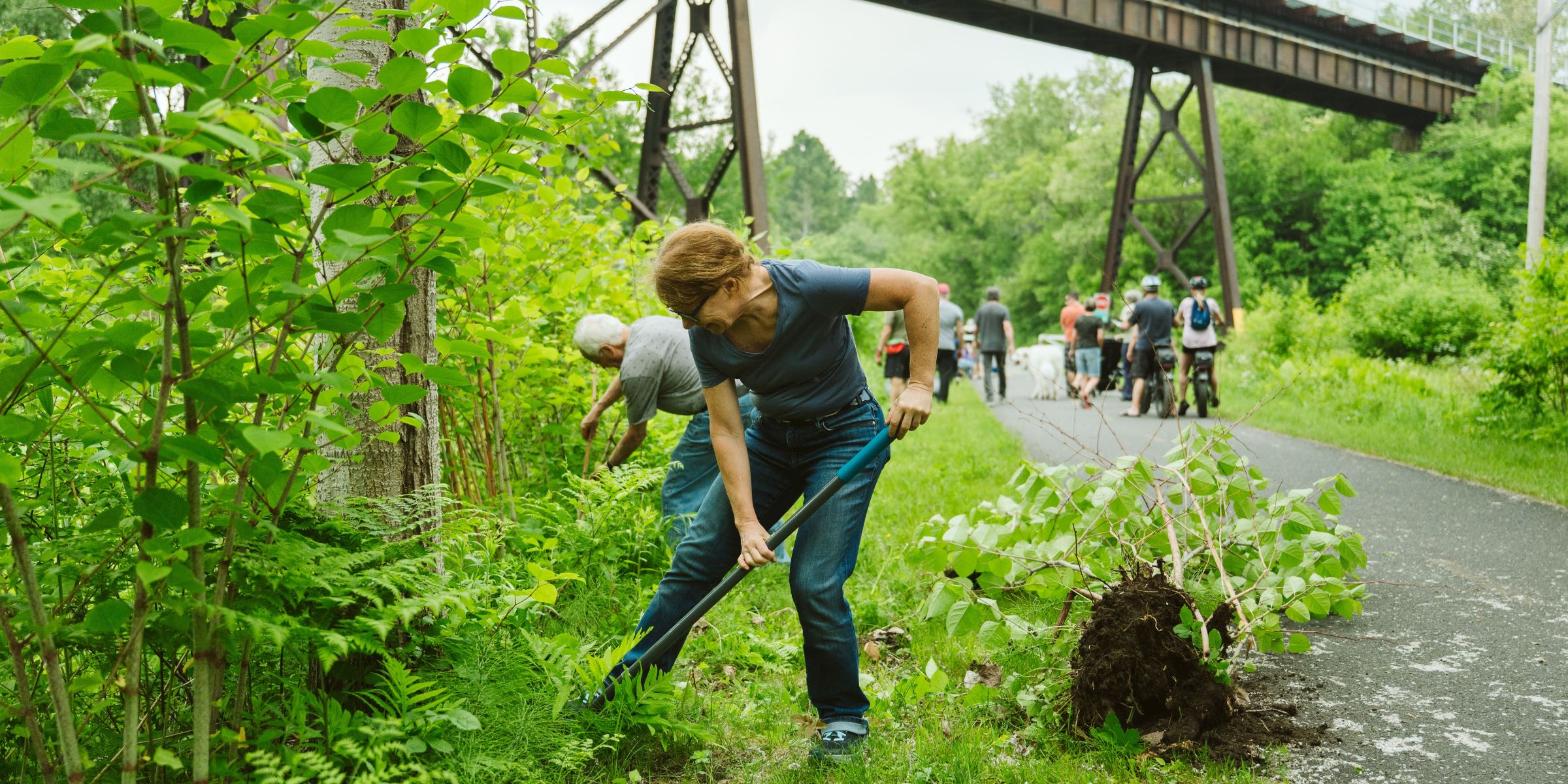 People perform trail maintenance on La Montagnarde in Eastman, QC.